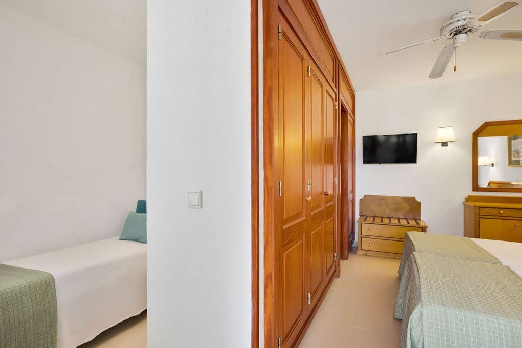 rooms-family-room-with-air-conditioning-and-balconyterrace
