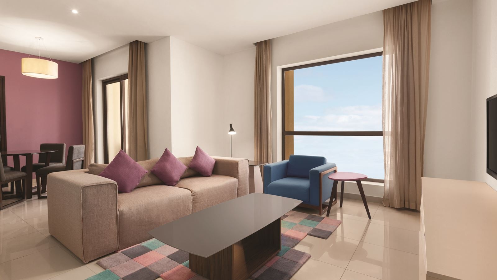 rooms-1bedroom-king-suite-partial-sea-view