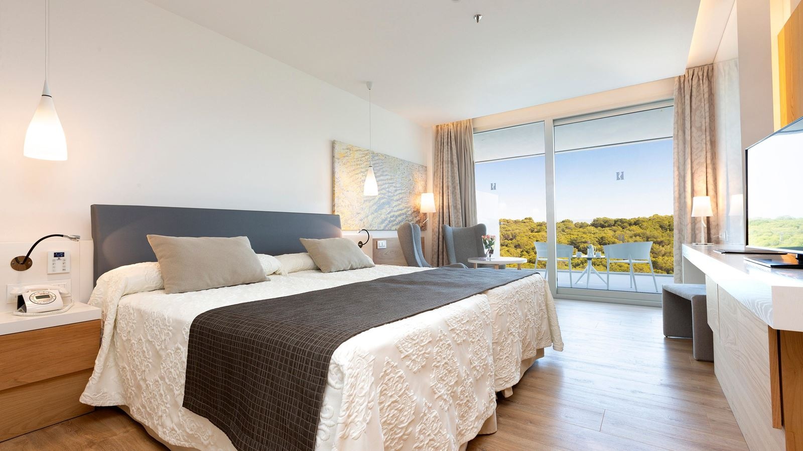 rooms-double-standar-monoparental-wiht-balcony